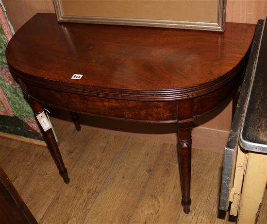 A Regency mahogany D-shaped folding top tea table W.91cm